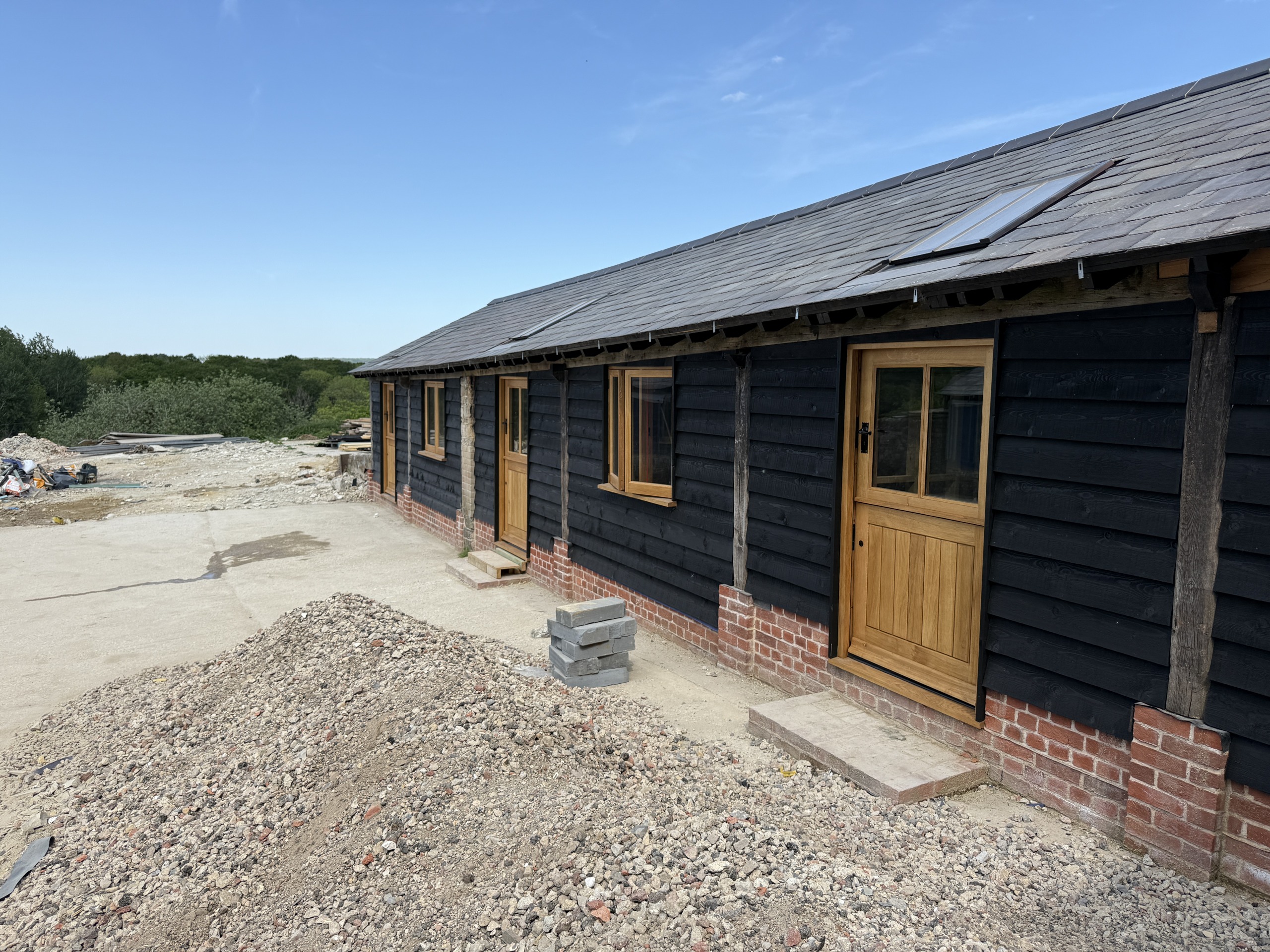 Dark timber cladding along the building elevation